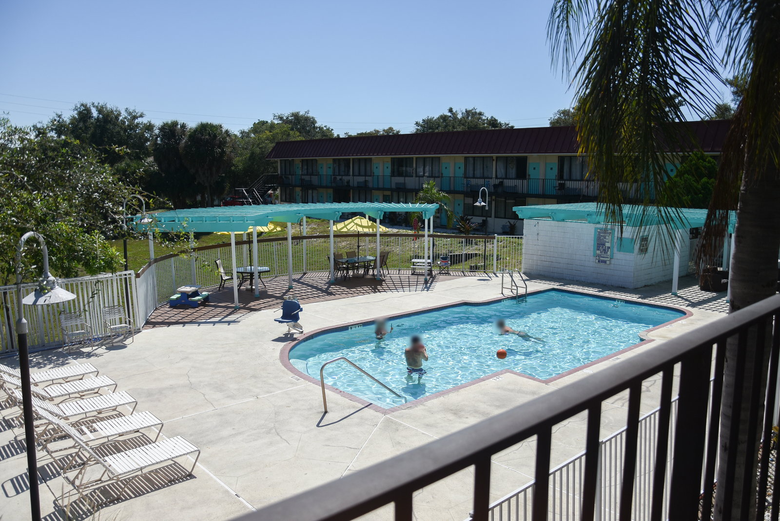 Pool seen from the second-floor walkway